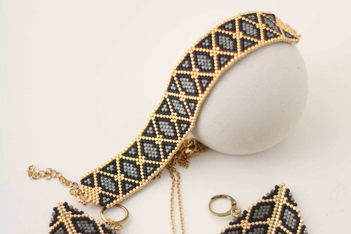 Geometric Miyuki beaded bracelet with gold-tone stainless steel clasp and extender chain