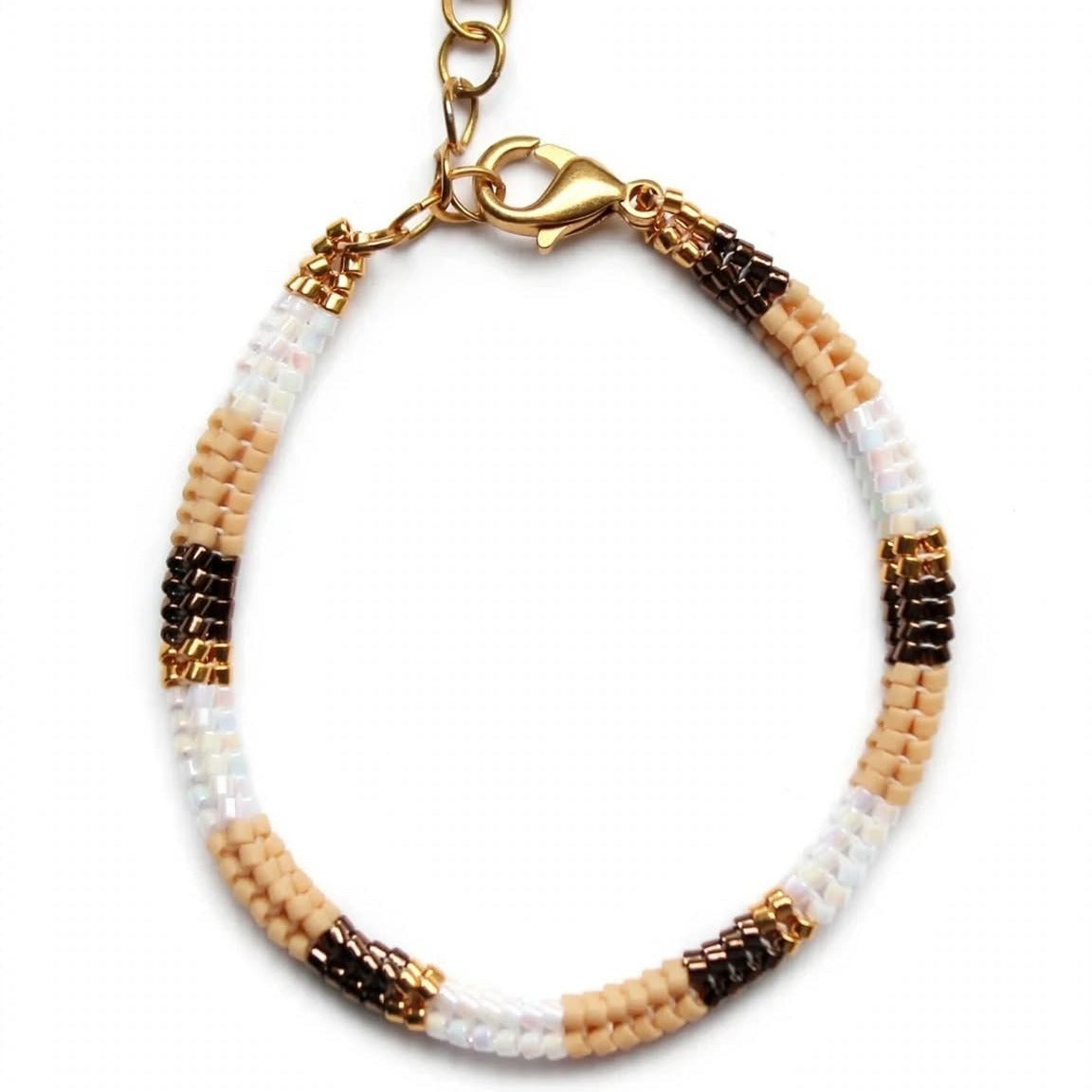 A beaded bracelet with alternating sections of white, light beige, and dark brown seed beads, finished with a gold-tone lobster clasp and extension chain, shown on a plain white background.